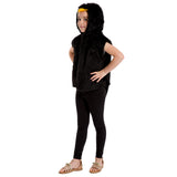 A young girl wearing a black hooded vest, black leggings, and sandals stands against a white background.