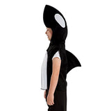 Side view image of a child dressed in a Charlie Crow black and white whale costume.