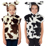Two young girls wearing cow-themed costumes, one with a brown and white spotted pattern and the other with a black and white spotted pattern.