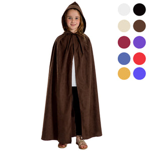 A young girl wearing a brown hooded cloak stands against a white background.