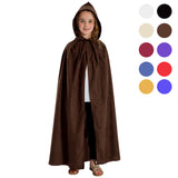 A young girl wearing a brown hooded cloak stands against a white background.